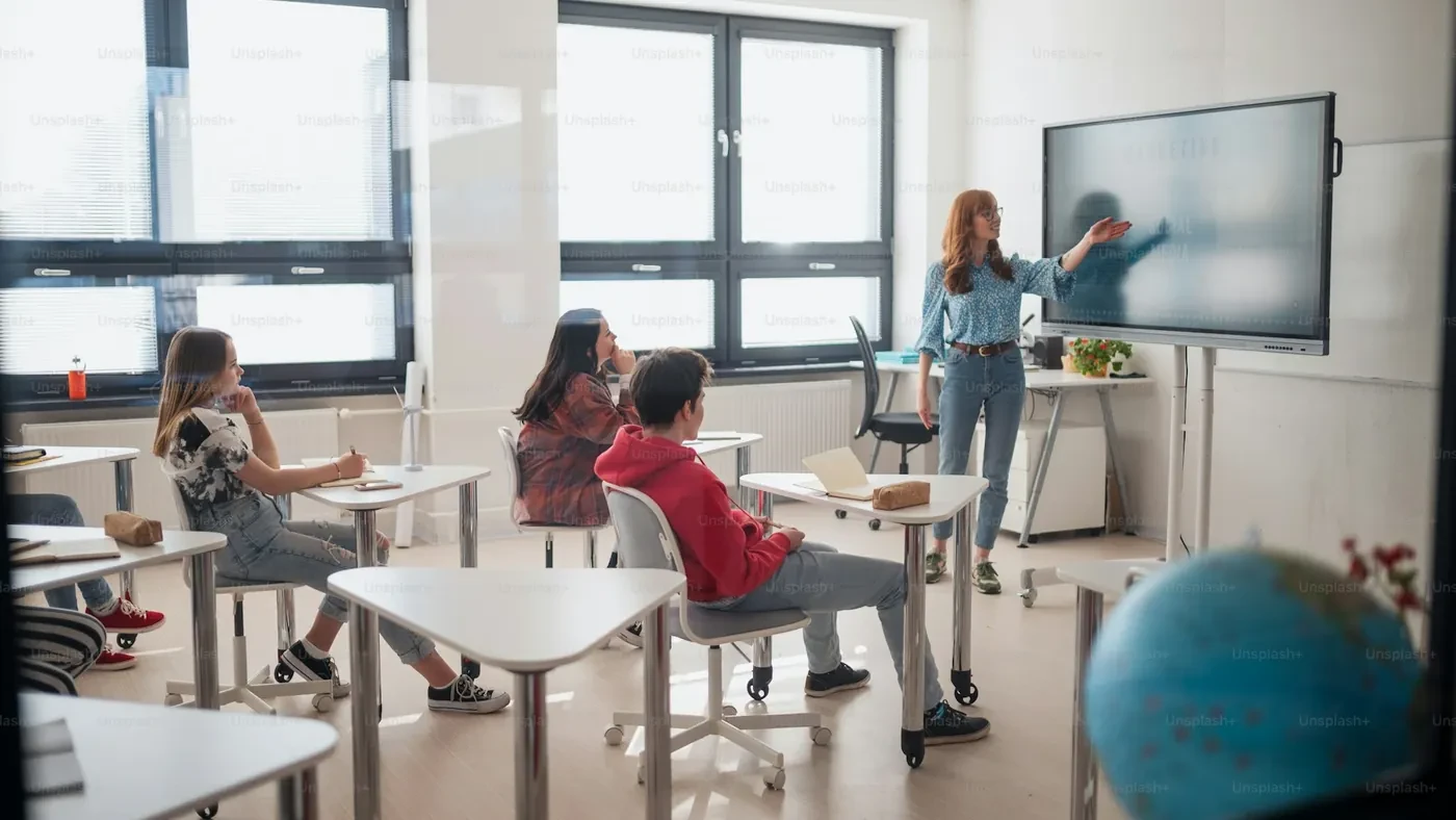 Teacher presenting to students in a classroom